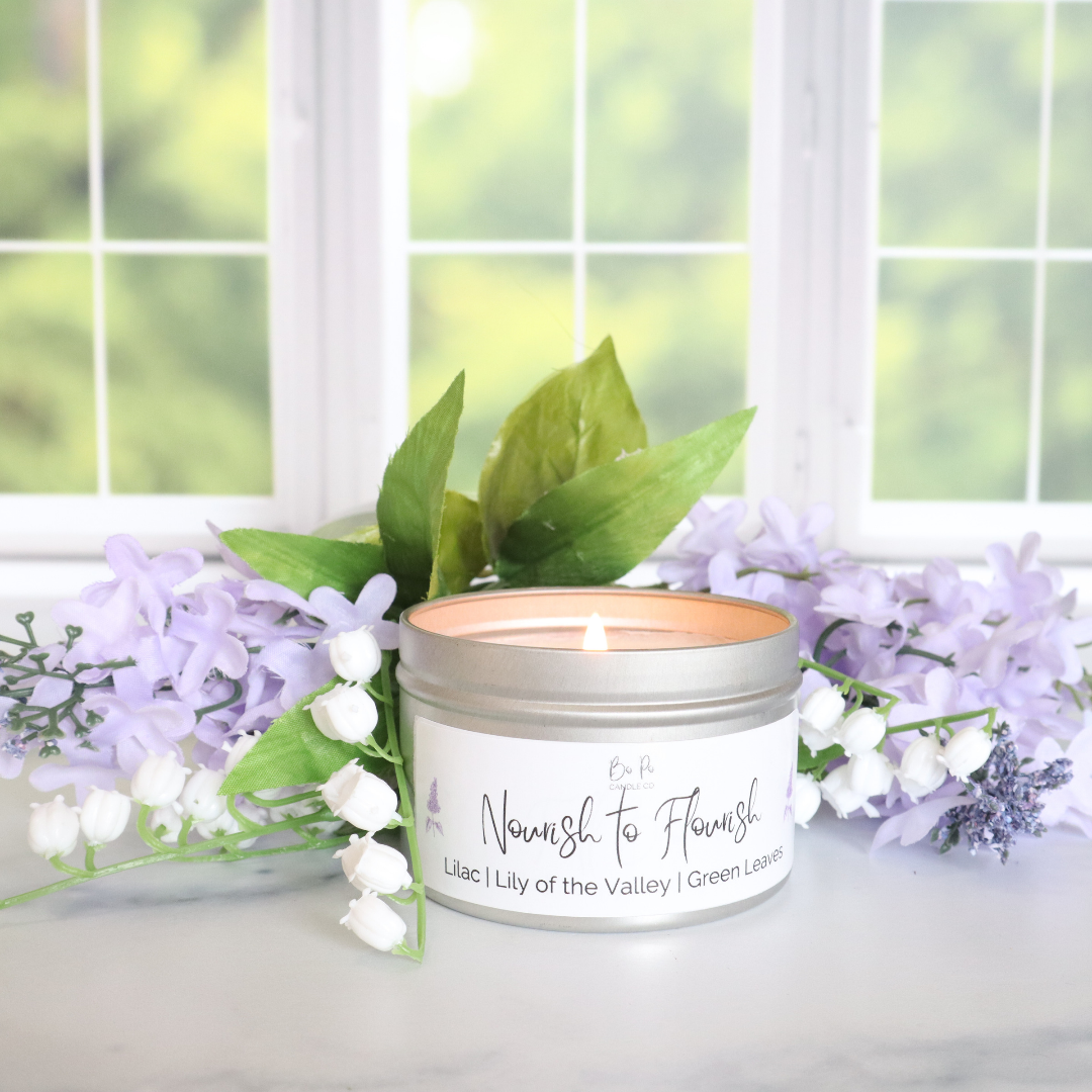 Nourish to Flourish Tin Candle | Lilac, Lily of the Valley, & Green Leaves | 6oz